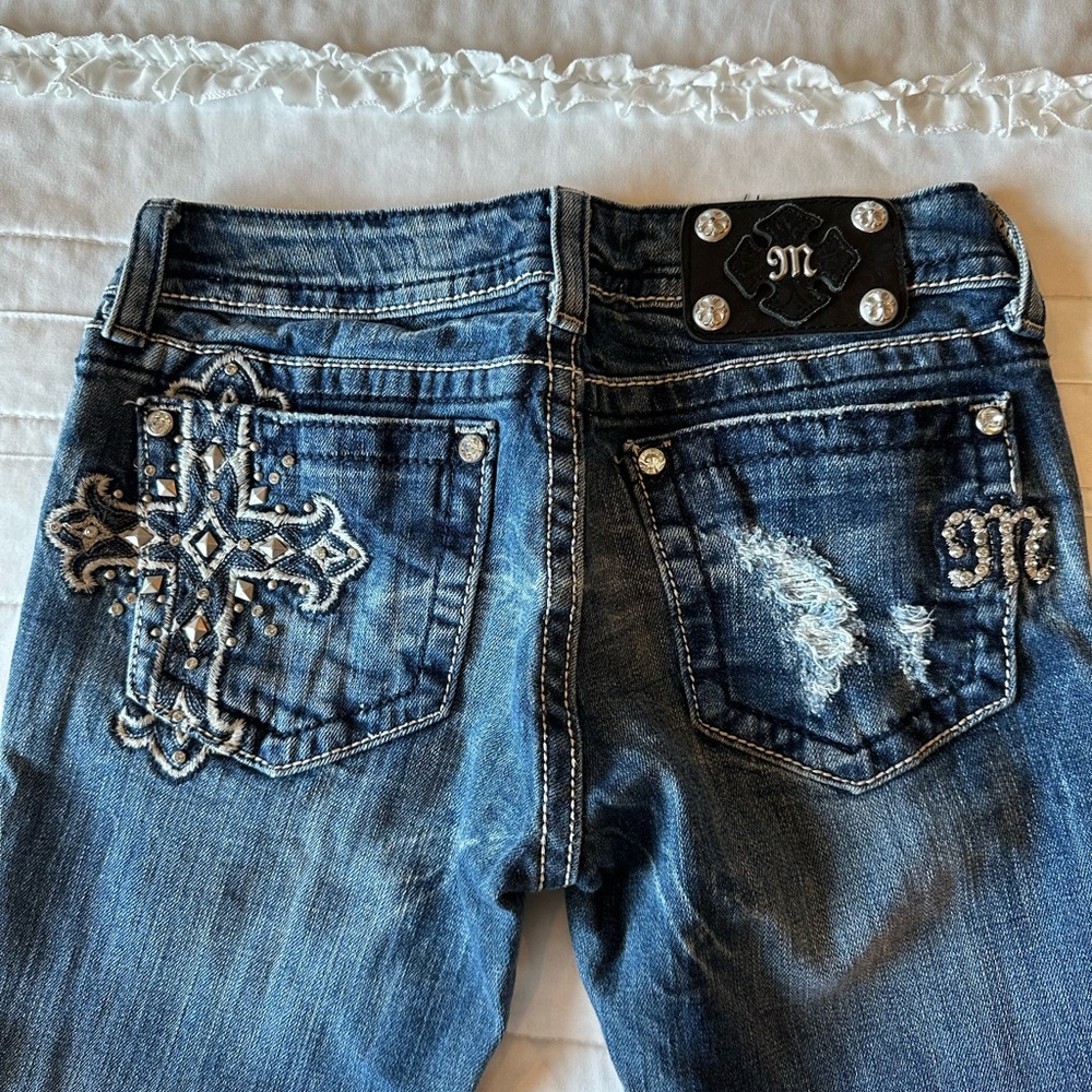 Miss Me Distressed Blue Boot Cut Jeans with Embellishments